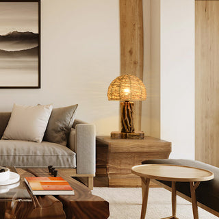 Woven shade rustic table lamp — wooden base close-up