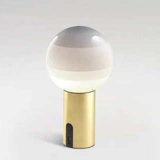 Artistic glass ball lamp close-up — USB charging detail
