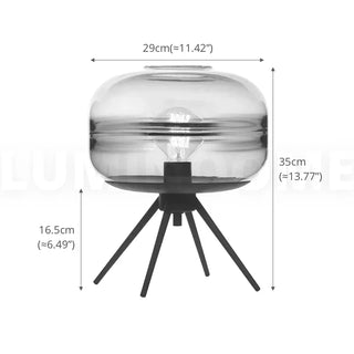 Tripod lamp glass shade close-up — warm LED detail