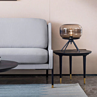 Warm white glass table lamp — tripod base wide view