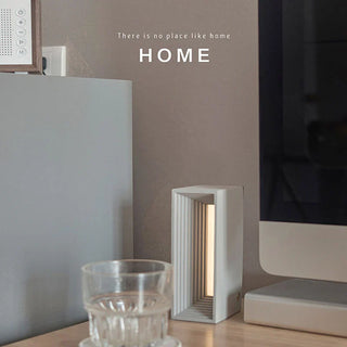Cement table lamp top view — architectural LED design