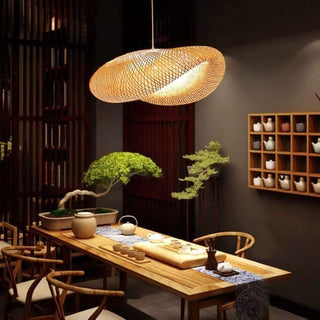 Handwoven rattan pendant over modern kitchen island