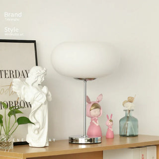 Vintage donut lamp front — mixed metal bedroom design