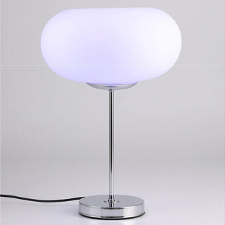 Donut lamp bedroom setting — vintage mixed metal