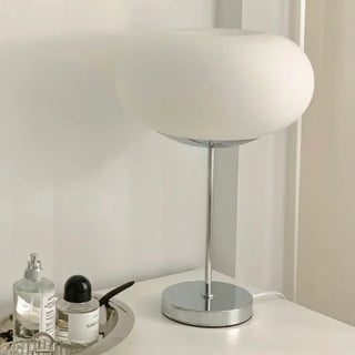 Donut table lamp close-up — vintage mixed metal detail