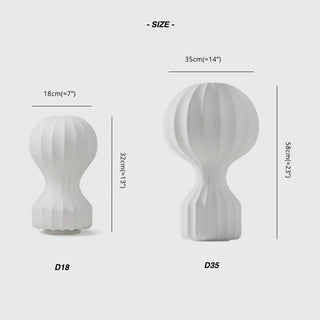 Scandinavian lantern lamp illuminated — creamy white warm glow