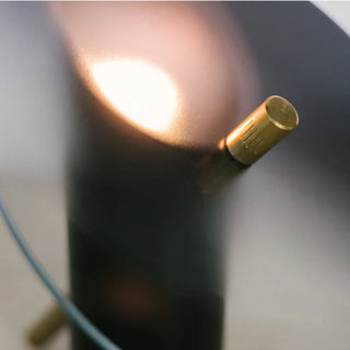UFO inspired lamp illuminated — modern warm ambient glow