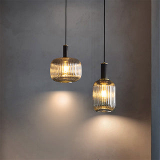 Oval ribbed pendant side angle — glass modern kitchen lamp