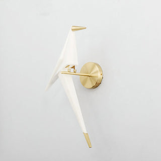 Bird-shaped gold wall light — contemporary metal sconce fixture