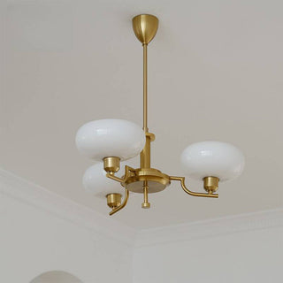 Medieval glass chandelier illuminated — designer iron warm ambient