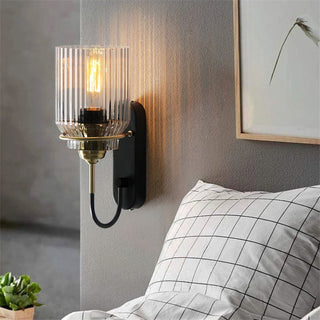 Modern glass funnel shade wall lamp in living room — sconce
