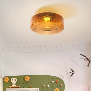 Vintage iron frame ceiling fixture with textured corrugated glass panels