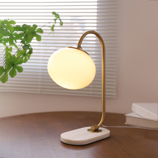 Marshmallow table lamp wide view — glass metal warm