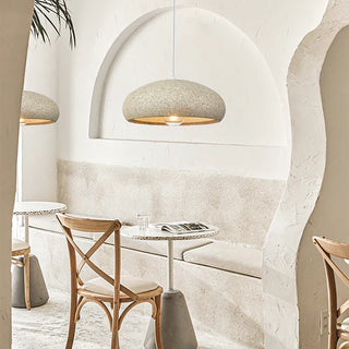 Beige stone pendant lamp detail — modern dining room ceiling