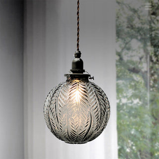 Small glass globe pendant light with black gold finish