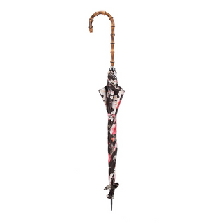 Elegant flowered parasol bamboo handle close-up