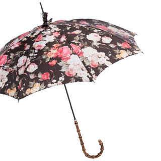 Women's flowered parasol umbrella bamboo handle side view