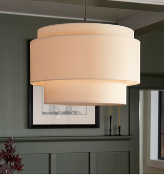 Tiered fabric pendant with beige linen shade for living room