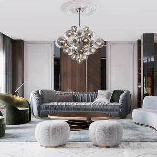 Modern bubble glass chandelier illuminated — cluster warm ambient