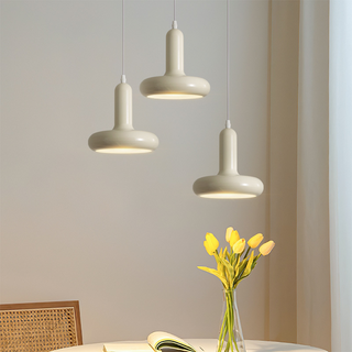 Cream die-cast metal pendant showing textured surface