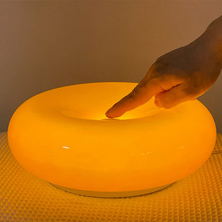 Orange donut lamp detail — cute glass LED warm texture