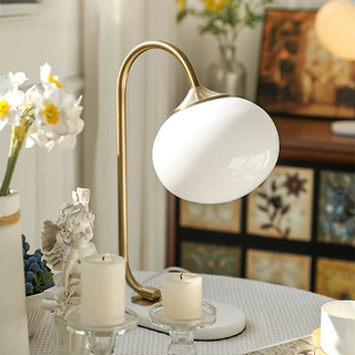 Marshmallow glass table lamp front — unique metal base design