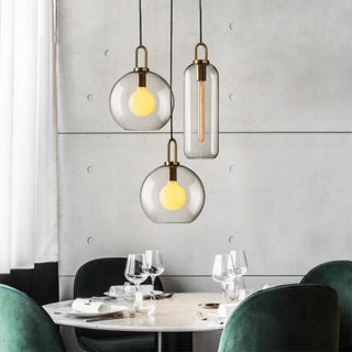 Modern glass pendant light — adjustable single bulb fixture for living room