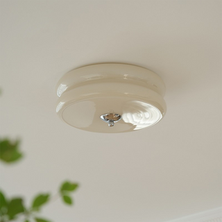 Art Deco cream ceiling lamp close-up, glass shade jade detail