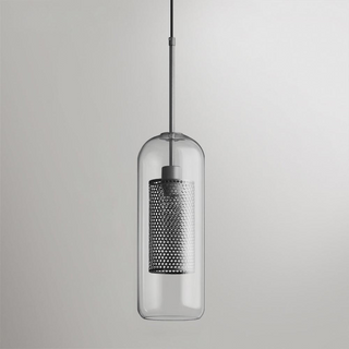 Gold finish glass pendant over contemporary dining table