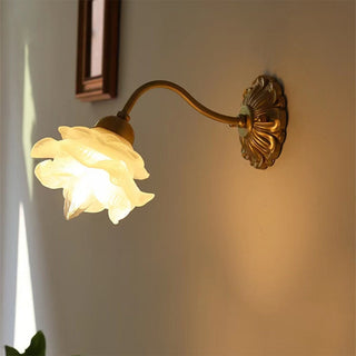 Retro copper petal glass wall lamp illuminated — vintage sconce