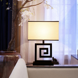 Geometric spiral table lamp — black metal close-up detail