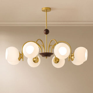 Contemporary cream ribbed chandelier ambient — glass dining warm