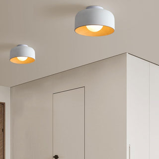 Minimalist bowl ceiling lamp close-up, metal sleek fixture
