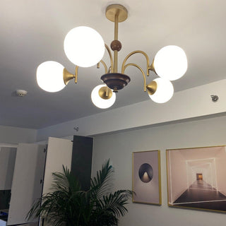 Cream glass ribbed dining chandelier front — contemporary warm