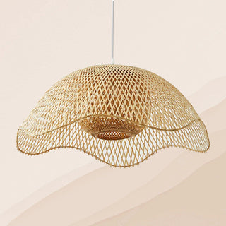 Woven bamboo pendant casting natural patterned shadow