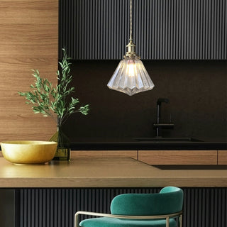 Contemporary diamond glass pendant over dining table