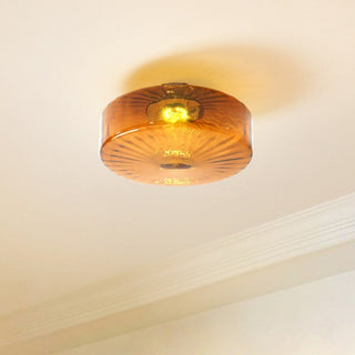 Close-up of iron frame and corrugated glass on medieval ceiling fixture