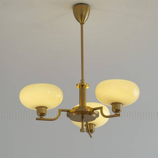 Medieval designer chandelier detail — iron glass warm ambient texture