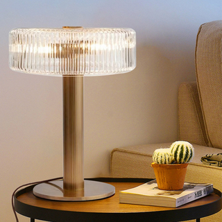 Gold glass bedroom lamp front — modern clear glass design