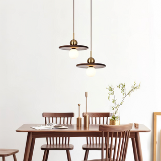 Saucer pendant with walnut wood shade and brass hardware