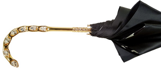 Elegant plaid umbrella double canopy gold handle close-up