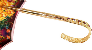 Luxury fuchsia double canopy umbrella Swarovski handle detail