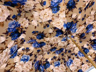 Luxury blue floral umbrella gold handle canopy view