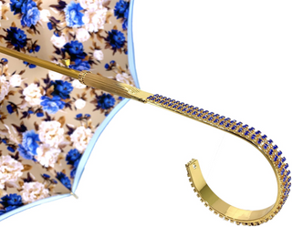Handmade blue umbrella 24K gold handle close-up top view