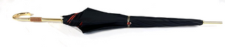 Elegant black giraffe satin umbrella 24K gold handle close-up