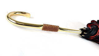 Luxury black satin giraffe umbrella 24K gold handle detail