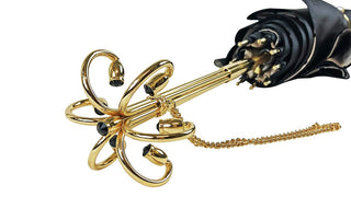 Luxury dot umbrella – gold handle and canopy detail
