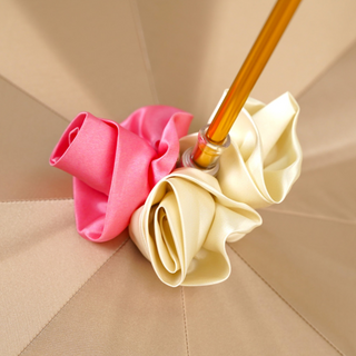 Women's hand-painted rose umbrella gold handle top view