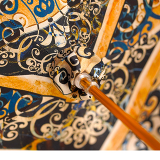 Italian Majolica pattern umbrella gold filigree handle view
