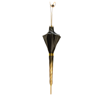 Elegant baroque luxury umbrella satin gold handle close-up